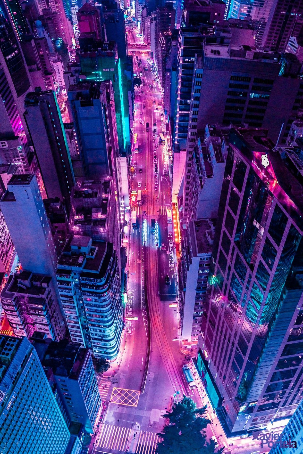 Aerial Explorations of International Cityscapes Washed in a Neon Glow by Xavier Portela.jpg