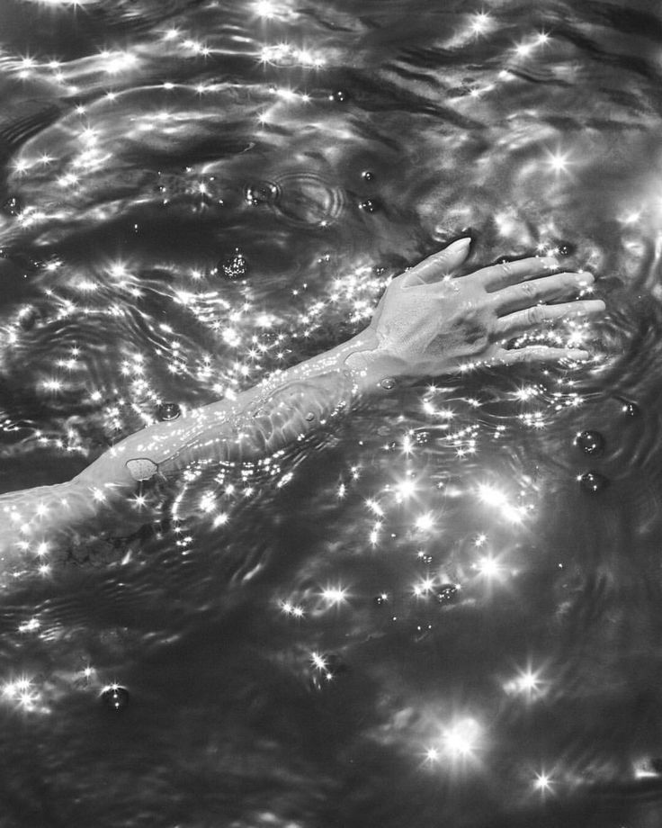 hand drifting through water _ aesthetic sea imagery.jpg